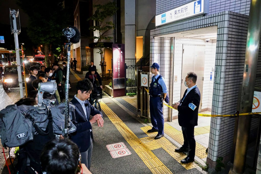 Police officers stand guard at an entrance of Todaimae Station on Tokyo Metro’s Namboku Line after a stabbing incident. Photo: AFP Police officers stand guard at an entrance of Todaimae Station on Tokyo Metro’s Namboku Line after a stabbing incident. Photo: AFP