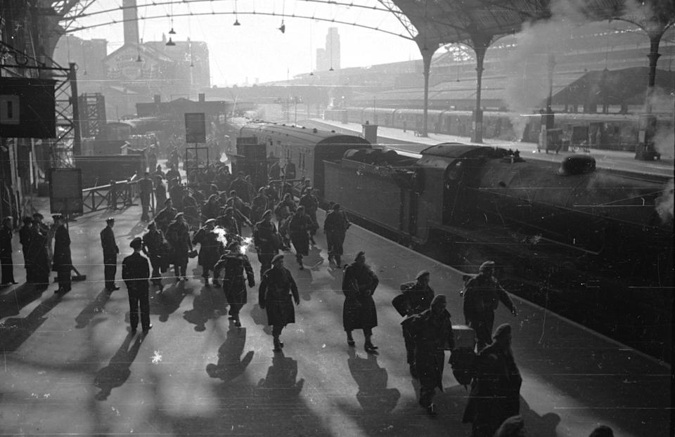 21st April 1945: Soldiers returning to their friends and family at a London railway station. Original Publication: Picture Post - 1953 - How To Welcome A Soldier Home - pub. 1945 (Photo by Picture Post/Hulton Archive/Getty Images)