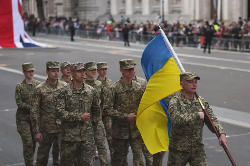 King Salutes Ukrainian troops at London VE day parade