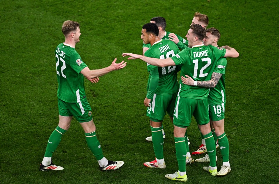 23 March 2025; Adam Idah of Republic of Ireland, centre, celebrates with team-mate, including, Nathan Collins, left, and Jimmy Dunne, 12, after scoring their side's second goal during the UEFA Nations League B/C Play-off 2nd Leg match between Republic of Ireland and Bulgaria at the Aviva Stadium in Dublin. Photo by Sam Barnes/Sportsfile