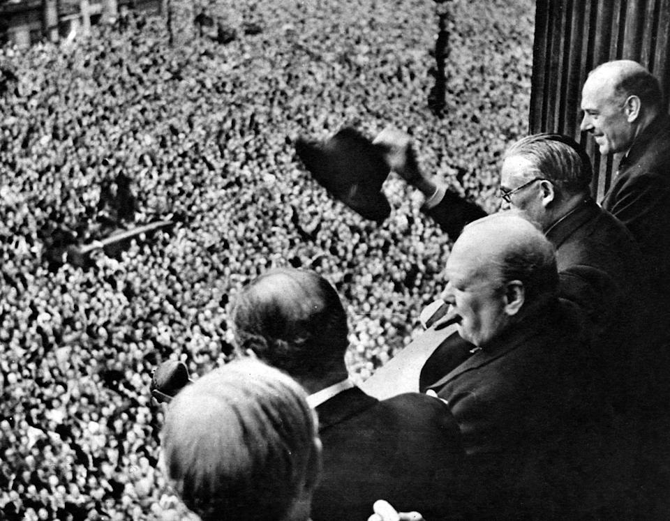 VE-Day Celebrations : The vast crowd outside the Ministry of Health, 8 May 1945.Mr Churchill and War Cabinet members acknowledging the cheering crowd in Whitehall, London, England. 19 May 1945
