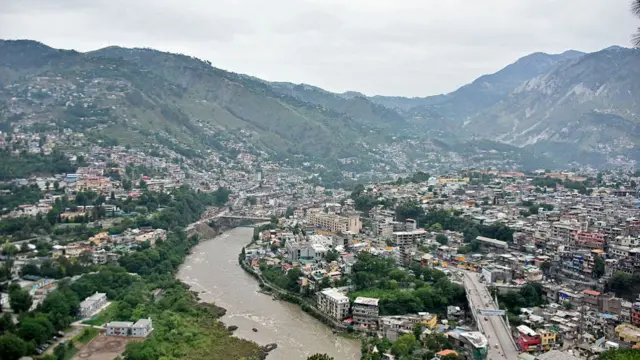 This photograph taken on May 9, 2025 shows the Neelum River flowing through Muzaffarabad, the capital of Pakistan-administered Kashmir.