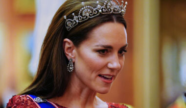 Kate Middleton wearing a tiara and a red gown