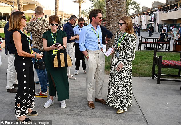 Princess Beatirce, 36, looked elegant in a khaki green and white £260 Sezane dress, gold Mary Jane ballet flats while Eugenie donned a black dress and accessorized with a tan wicker bag