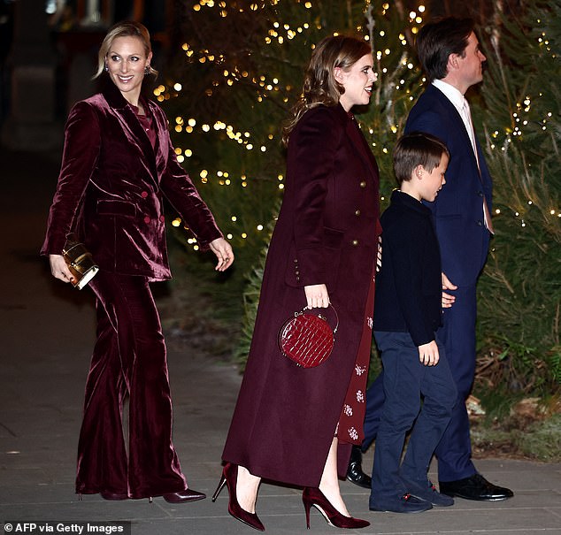 Princess Beatrice (C), her husband Edoardo Mapelli Mozzi (R) and stepson Wolfie (2R) arrive with Zara at the "Together At Christmas" Carol Service