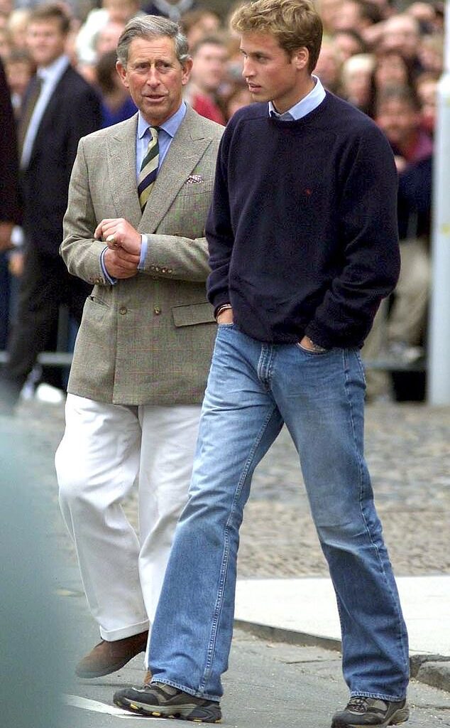 Prince William arrives with his father to St Andrews University in Fife, Scotland in 2001