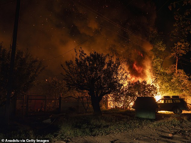 Zelensky thanked Pavel for his country's military support and said Ukraine hopes to receive 1.8 million artillery shells in 2025 as part of a Czech-led initiative to supply military aid to Kyiv. Pictured: Fire breaks out after Russia conduct shelling on residential buildings in Druzhkivka city of Donetsk Oblast on May 3