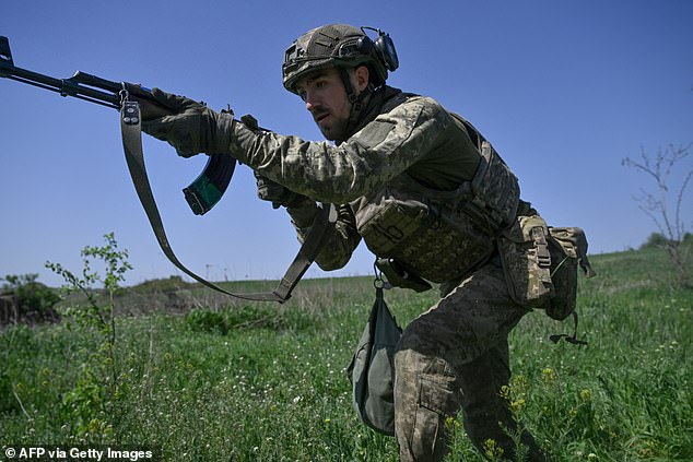 Zelensky also said he had discussed with Pavel 'the next steps in the development of our aviation coalition', namely the creation of an F-16 training school. He said that such a base could not be opened in Ukraine because of Russian attacks. Pictured: A young member of the 28th Separate Mechanized Brigade takes part in a tactical training exercise