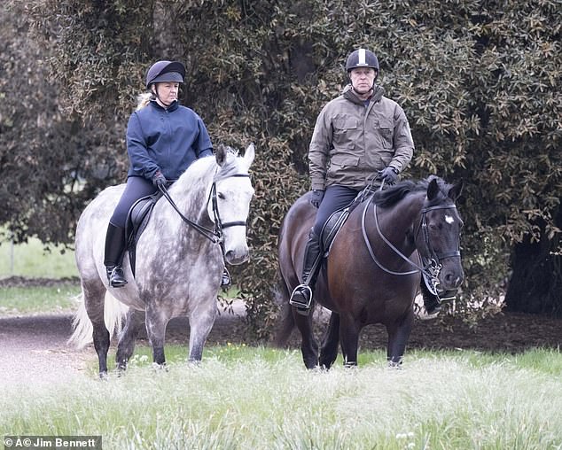 Dressed in a gray rain jacket and dark navy trousers, the royal was accompanied by a female groom