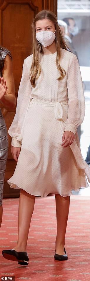 The ivory chiffon design by Carolina Herrera had previously been worn by her younger daughter, Infanta Sofia, at the 2021 Princesa de Asturias Awards