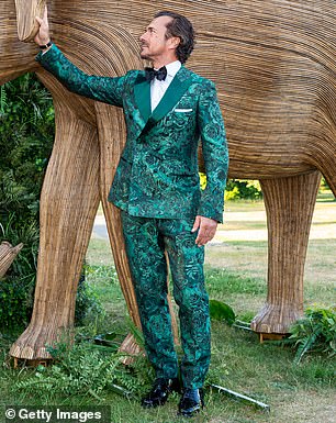 The star, known for his role on Emily in Paris among others, sported a green paisley suit