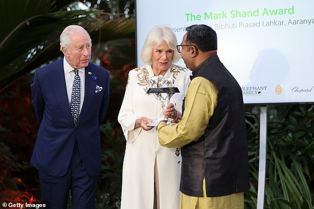 During the special event, both the King and Queen handed out awards (pictured: Camilla presents the Mark Shand award)