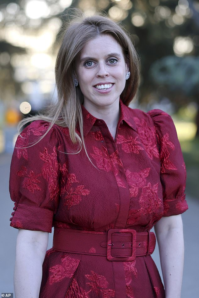 The 36-year-old royal looked stylish in a red Rebecca Vallance gown, with a full skirt, and wide belt