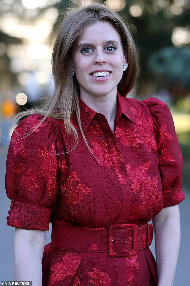 Beatrice paired her striking outfit with a bedazzled set of floral diamond earrings