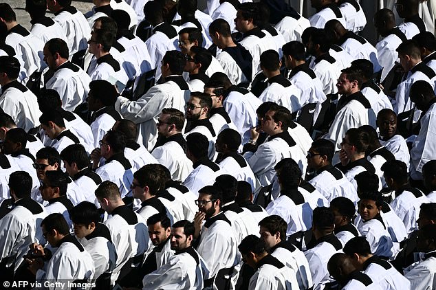 Priests wait for the start of the Holy Mass for the Beginning of the Pontificate of Pope Leo XIV
