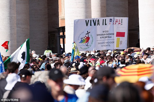 Faithful gather on the day Pope Leo XIV holds his inaugural Mass in Saint Peter's Square