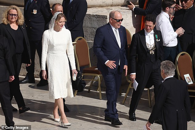 Princess Charlene of Monaco and Prince Albert II of Monaco arrive ahead of the inauguration mass of Pope Leo XIV