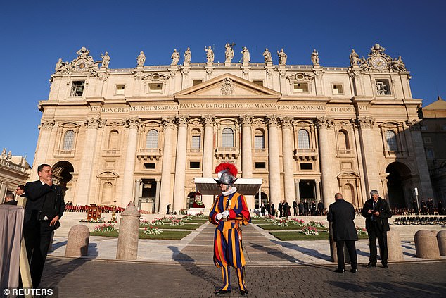 A Swiss Guard stands in St Peter's Square, on the day Pope Leo XIV holds his inaugural Mass