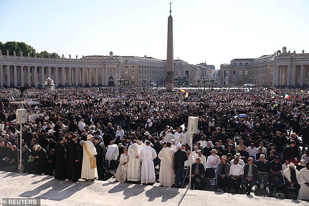 Faithful gather at the Saint Peter's Square, on the day Pope Leo XIV holds his inaugural Mass