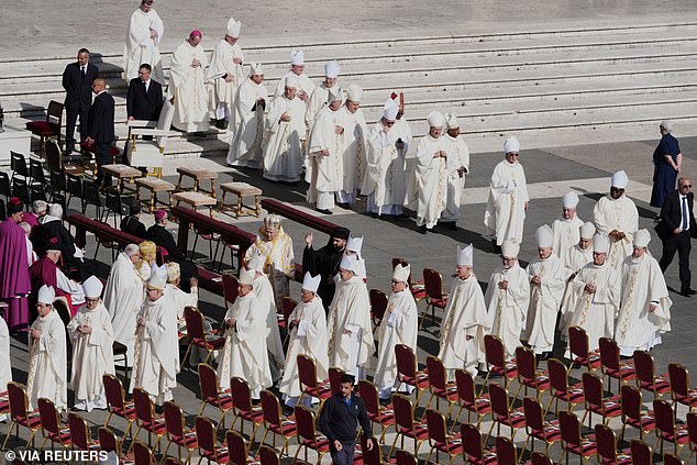 Clergy members gather on the day of Pope Leo XIV's inaugural Mass at the Vatican