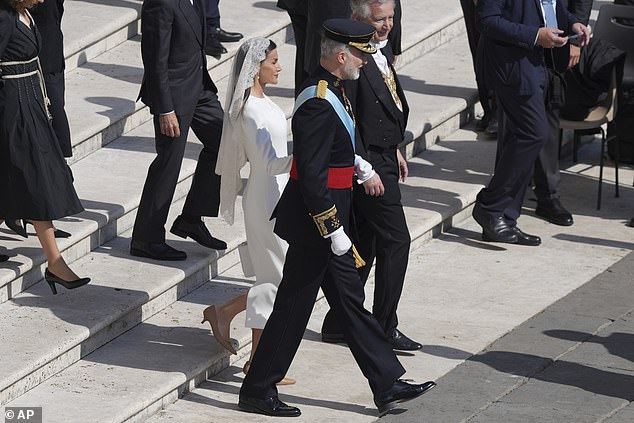 Spain's King Felipe VI and Queen Letizia arrive for Pope Leo XIV's formal inauguration