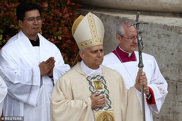 Pope Leo XIV walks during his inaugural mass in St Peter's Square at the Vatican, Rome -- May 18, 2025