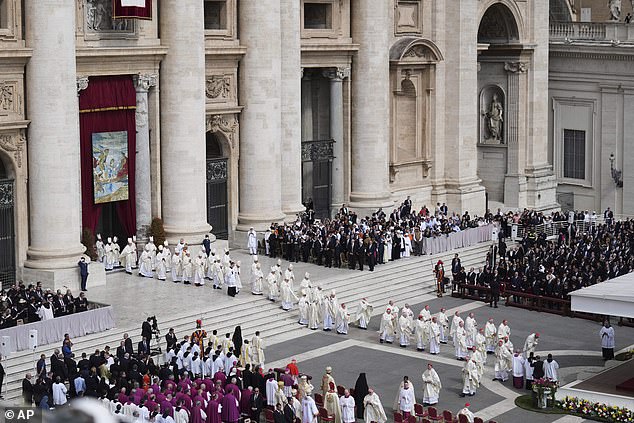 Cardinals prepare take their places during the inaugural mass of Pope Leo XIV