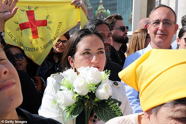 People gather in St.Peter's Square for Pope Leo XIV's inauguration mass