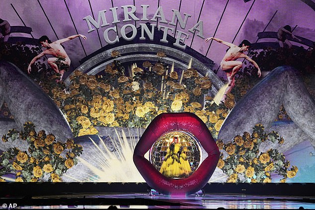 Miriana pulled out all the stops to try and get into the next round by walking on stage out of some huge lips, and went on to show off her racy dance moves. Her backdrop appeared to be a mouth and and wide open legs at either side