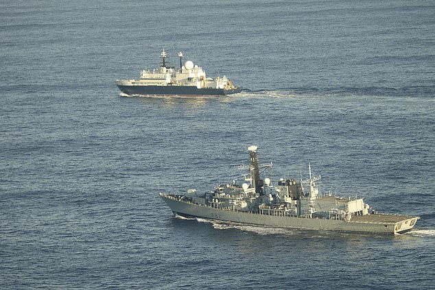 British frigate HMS Somerset (pictured front) flanks the Russian spy ship Yantar near UK water - which was feared to be hoovering up intelligence about the UK's underwater infrastructure