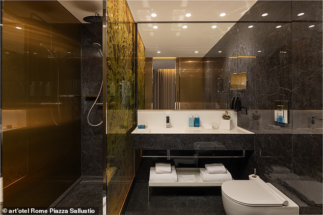 A guest bathroom at art'otel Rome Piazza Sallustio