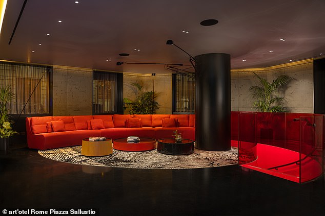 Much of its design and décor pays tribute to celebrated Roman painter and sculptor Pietro Ruffo. Pictured: art'otel's sleek and upscale lobby