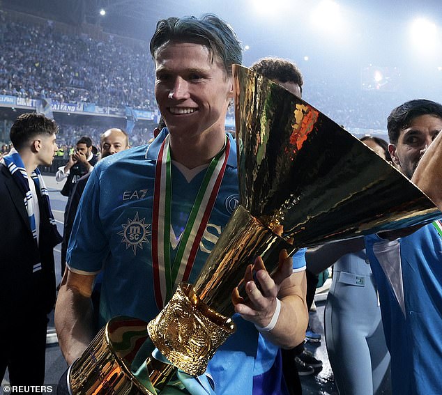 McTominay celebrates with the Scudetto after Napoli's last-day win over Cagliari