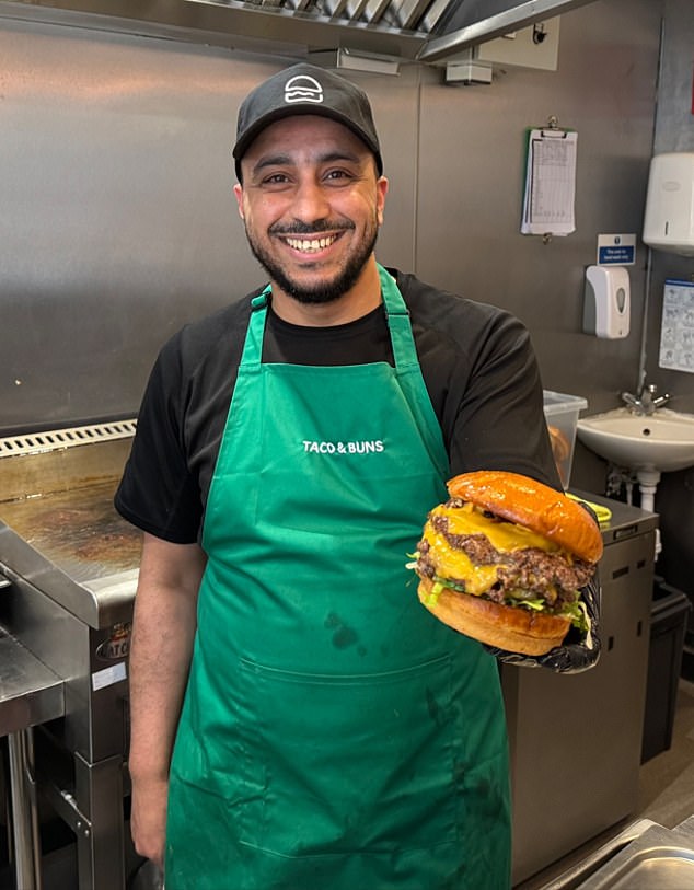 Takeaway owner Karym Marida, 41, (pictured) holding a triple cheeseburger at his zero-rated Taco and Buns store in Leyton, east London