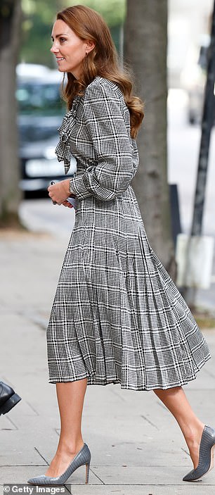 Princess Kate also wore this houndstooth Zara dress during a London University visit in 2021