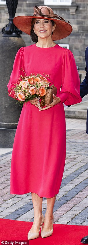 In June 2024, Mary attended the 175th anniversary of the Constitution held at Christiansborg Palace wearing a gorgeous hot pink Andrew GN dress