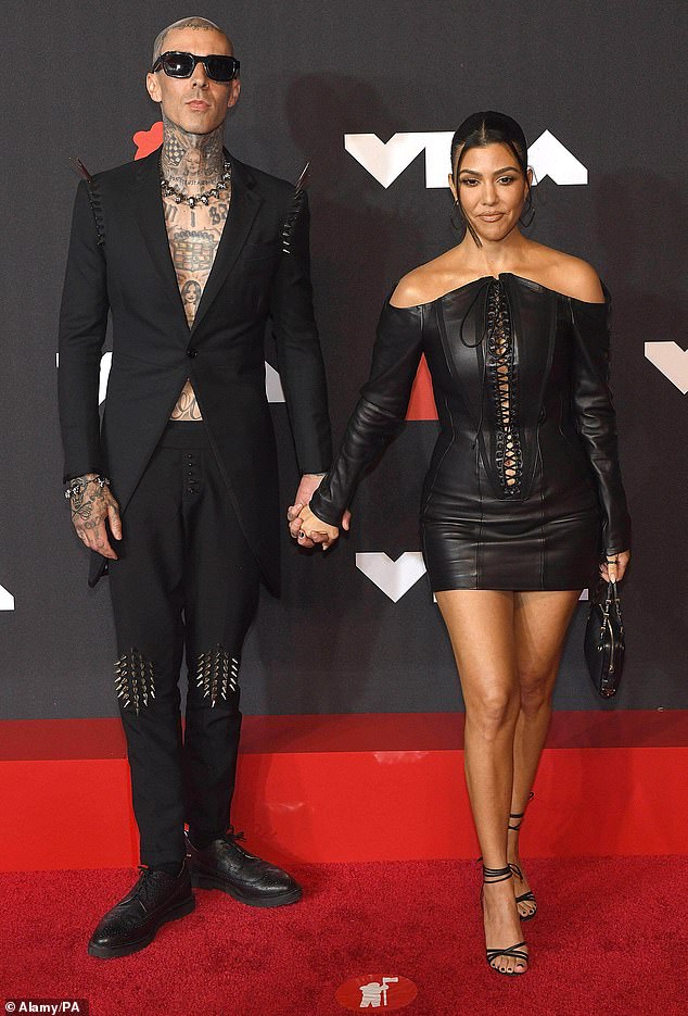 Kourtney married Blink-182 drummer Travis Barker in 2022, before welcoming their son in November 2023; the couple seen in 2021