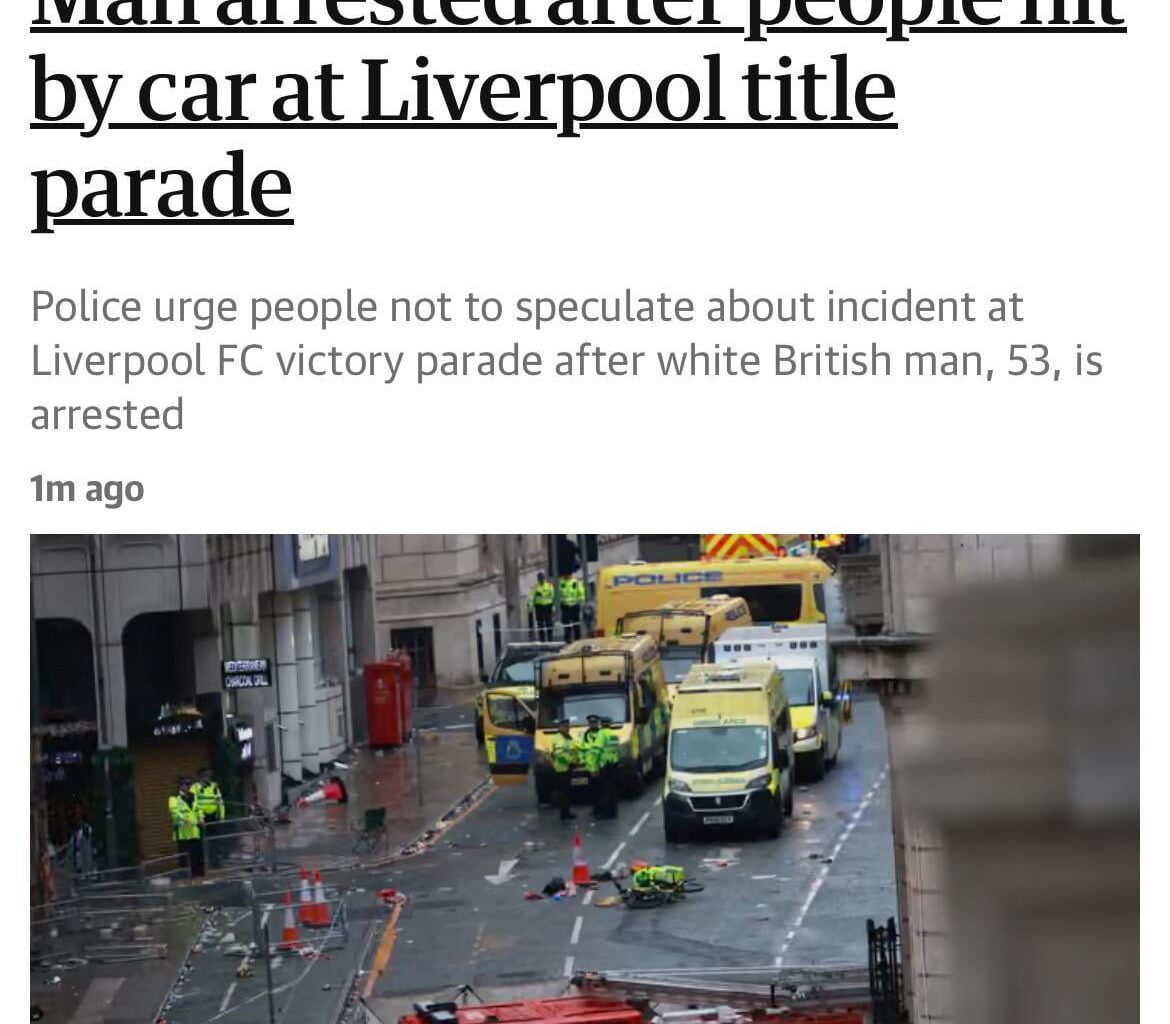 According to the Guardian, a white British man was arrested after the Liverpool title parade crash