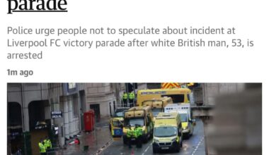 According to the Guardian, a white British man was arrested after the Liverpool title parade crash