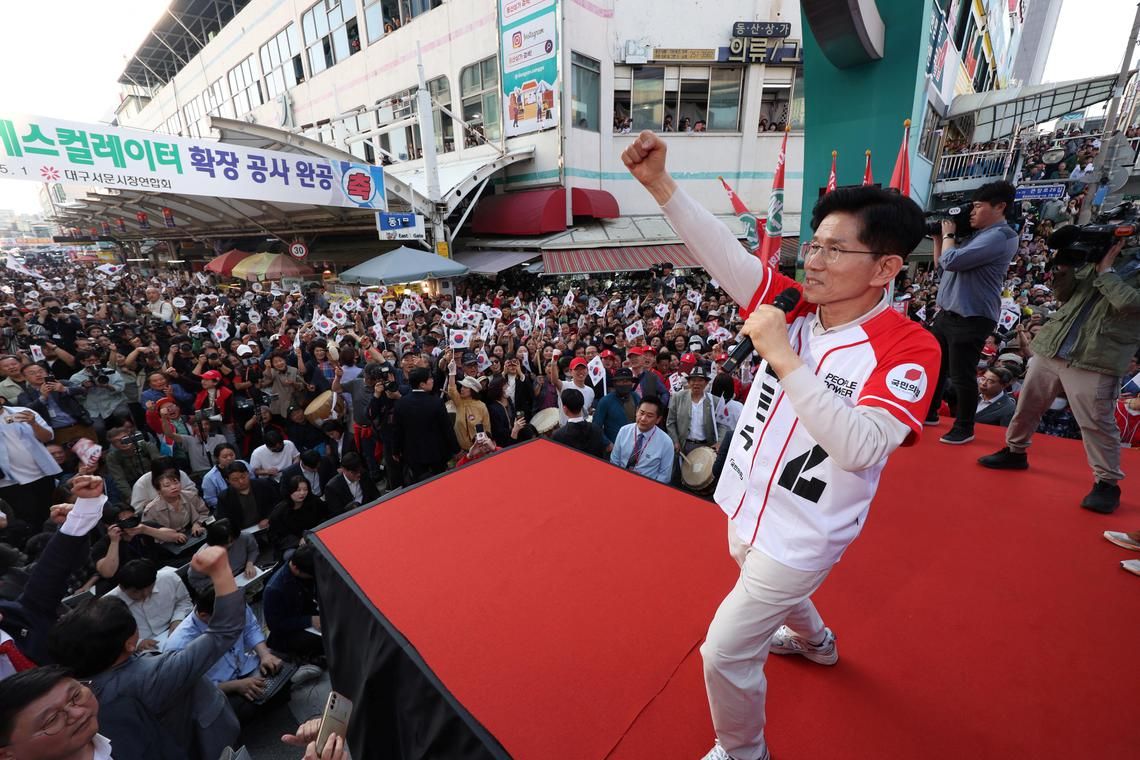 Kim Moon-soo, the presidential candidate for South Korea's conservative People Power Party, gestures during his election campaign rally at a traditional market in Daegu, South Korea, May 12, 2025.    Yonhap via REUTERS/File Photo