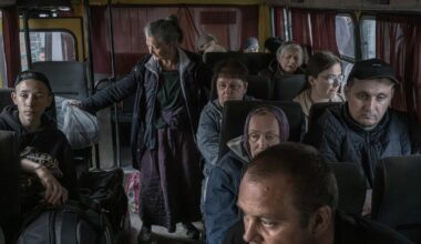 Ukrainians who fled Russian-occupied areas are transported to a center for displaced people, in Sumy, Ukraine, April 28, 2024.