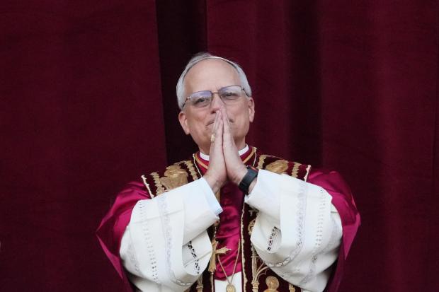 Newly elected Pope Leo XIV appears on the balcony of...