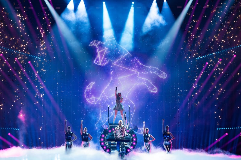 Emmy Kristiansen rehearsing her song with her brother