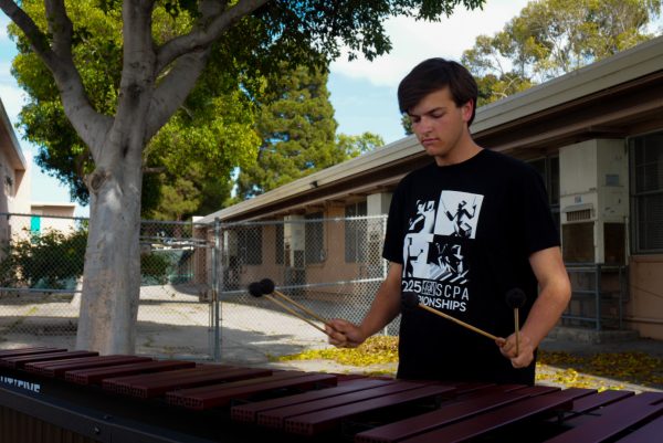 OCI precisionist Jake Smith plays the marimba at Gardena High School on Friday, May 16 at the blacktop. He does rehearsals there every Saturday and Sunday. (Jamila Zaki | The Union)