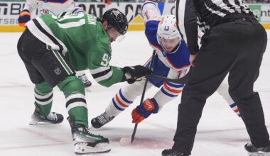 Dallas Stars center Tyler Seguin (91) and Edmonton Oilers center Mattias Janmark (13) face-off for the puck during the second period in Game 1 of the Western Conference finals in the NHL hockey Stanley Cup playoffs Wednesday, May 21, 2025, in Dallas. (AP Photo/LM Otero)