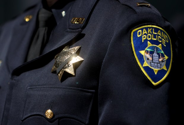 Members of the Oakland Police Department take part in a ceremony to honor the 55 Oakland police officers who died in the line of duty on Thursday, May 8, 2025, in Oakland, Calif. About 200 people, including relatives of the deceased officers, current and retired Oakland police officers and city and county officials took part in the annual ceremony. The memorial wall inside department headquarters has the names of the 55 Oakland police officers killed in the line of duty between 1867 and 2024. (Aric Crabb/Bay Area News Group)