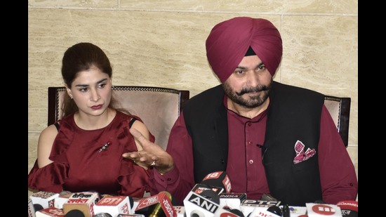 Former Punjab cabinet minister Navjot Singh Sidhu along with her daughter Rabia Sidhu addresses a press conference at his residence in Amritsar on Wednesday. (Sameer Sehgal/Hindustan Times)