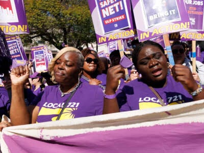 Valencia Simpson (left) and Asiata Adekunle Murtala (right) rally with more than 55,000 members of SEIU Local 721 on strike on April 29, 2025, in Los Angeles, California.