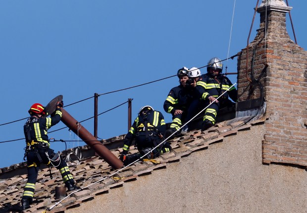 The chimney used to communicate the choosing of a new Pope is erected on the roof of the Sistine Chapel on Friday, ahead of the Conclave beginning on May 7th. 