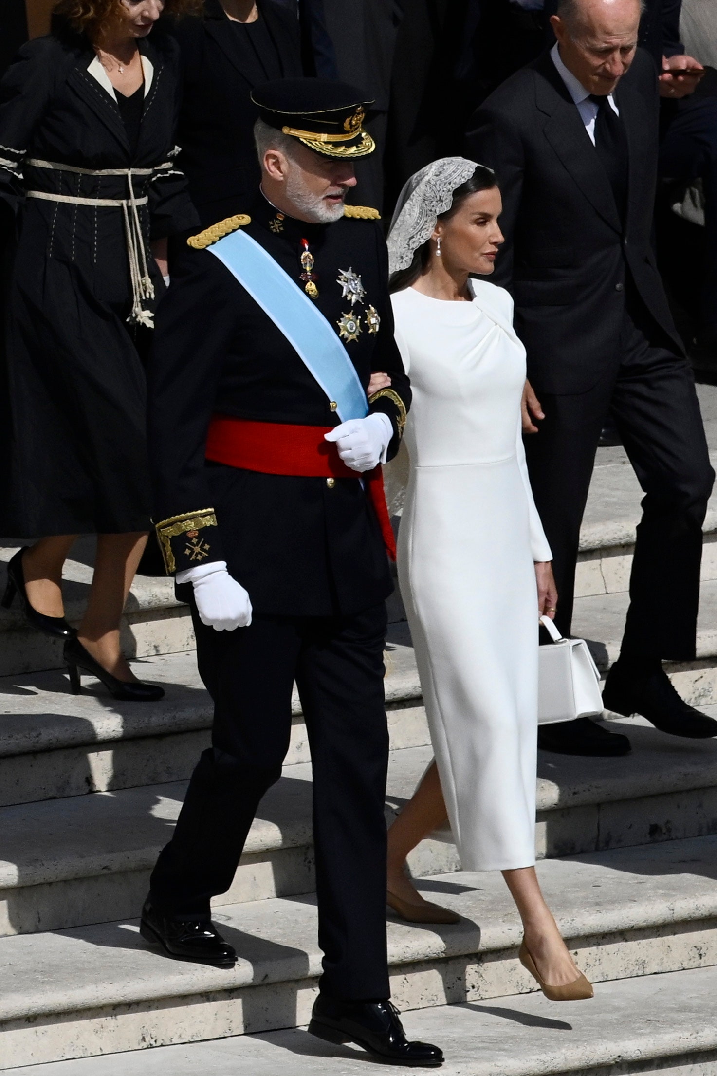 Image may contain John Zaffis Andrzej Pieczyński Cindy Crawford Person Clothing Glove Adult Footwear and High Heel